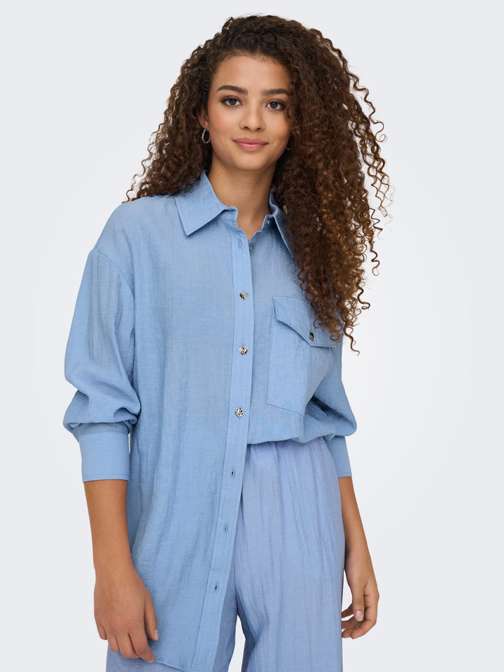 Only ONLTANIA LIFE LS SHIRT WVN lichtblauw – dames blouse