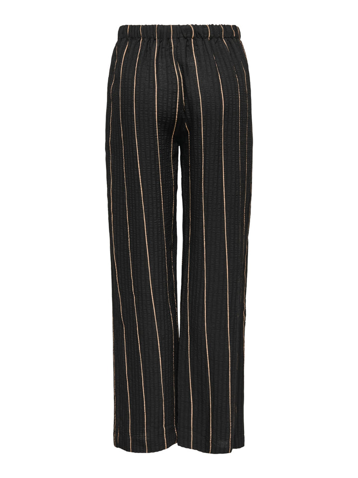 Jacqueline de Yong JDYAVA MW PULL UP PANT zwart dessin – damesbroek
