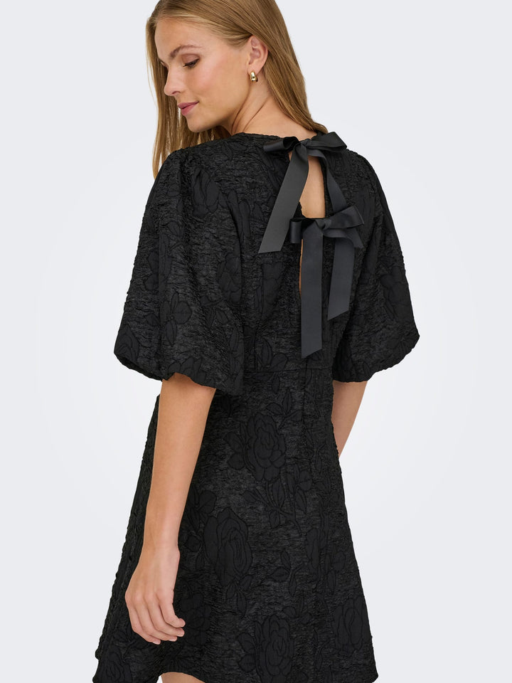 Jacqueline de Yong JDYDORA S/S BOW DRESS zwart – dames jurk