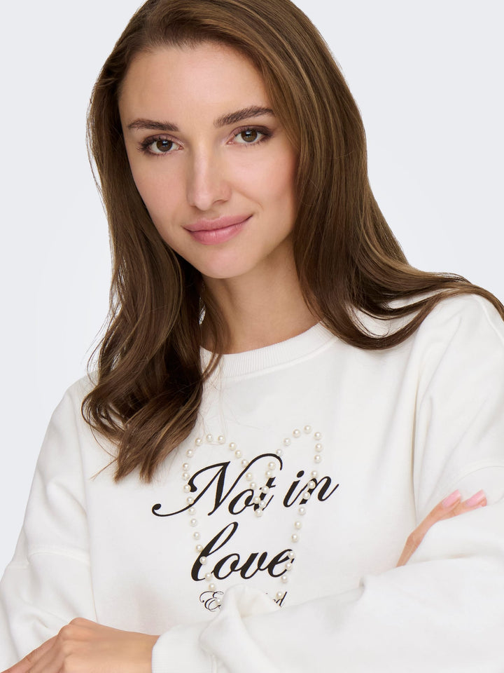 Only Kiara sweater dames off-white – trendy en comfortabel